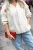Laine_Poolaknits_valkoinenneuletakki-5.webp